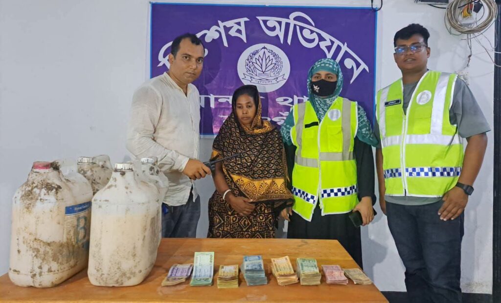 নওগাঁর মান্দায় মাদসম্রাজ্ঞী ডলি রানী গ্রেপ্তার,মাটির নিচে মিলল ৫০ লিটার মদ